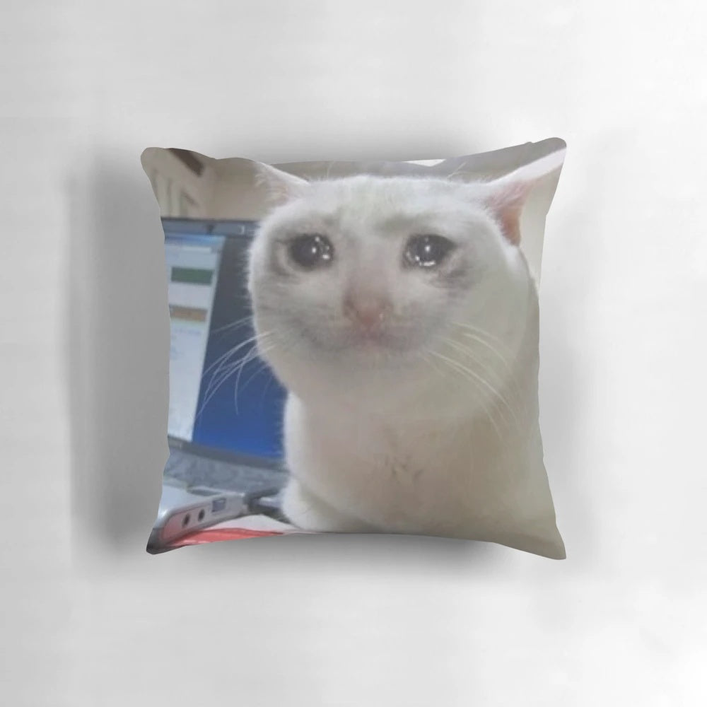 Soft, plush pillow featuring a crying cat meme design, perfect for cat lovers and meme enthusiasts.