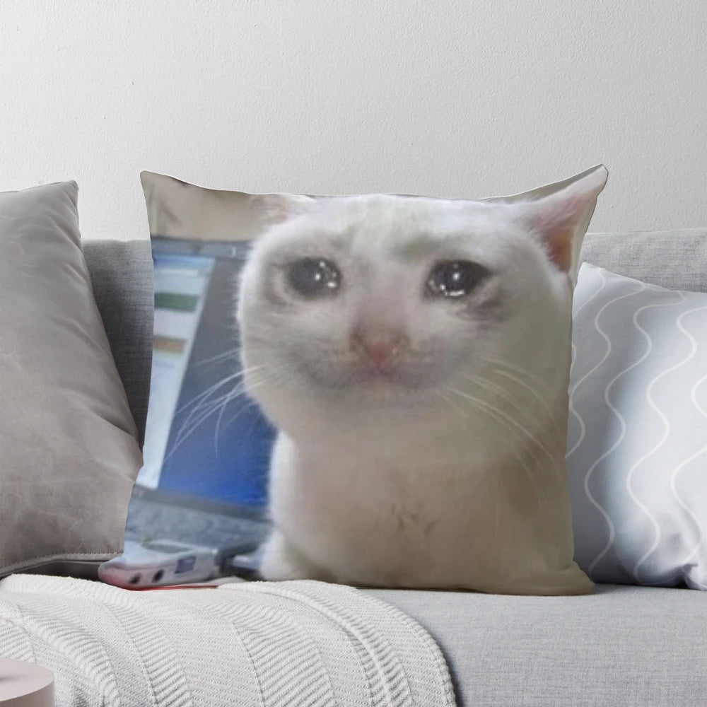 Soft, plush pillow featuring a crying cat meme design, perfect for cat lovers and meme enthusiasts.