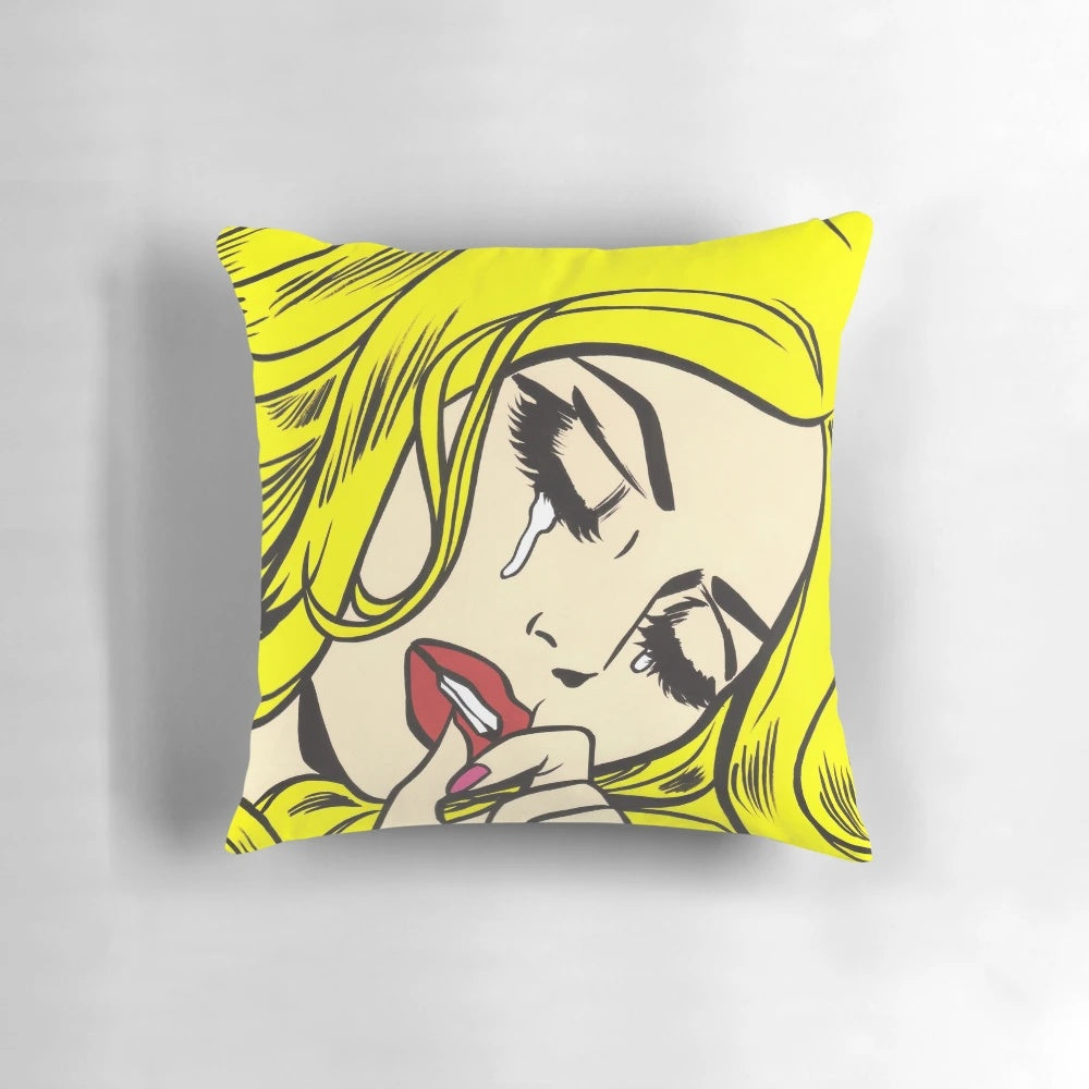 A decorative throw pillow featuring a crying comic book style illustration in a vintage modern art design.