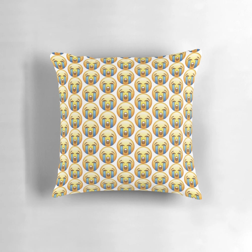 Crying emoji pillow with a sad but cute expression
