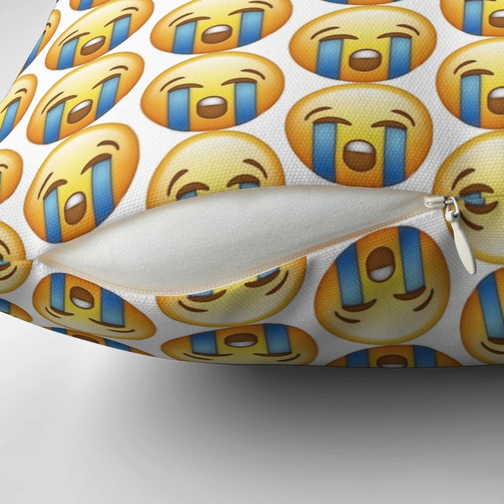 Crying emoji pillow with a sad but cute expression