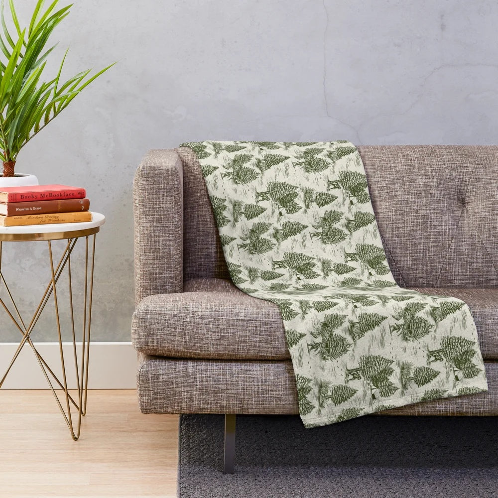 Bigfoot/Sasquatch inspired plush blanket featuring a forest green toile de jouy pattern