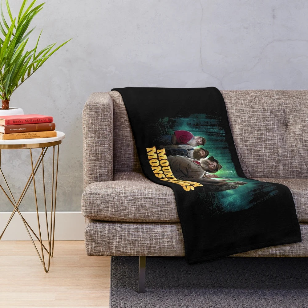 Monster Hunter inspired plush blanket featuring various cryptid and supernatural creatures