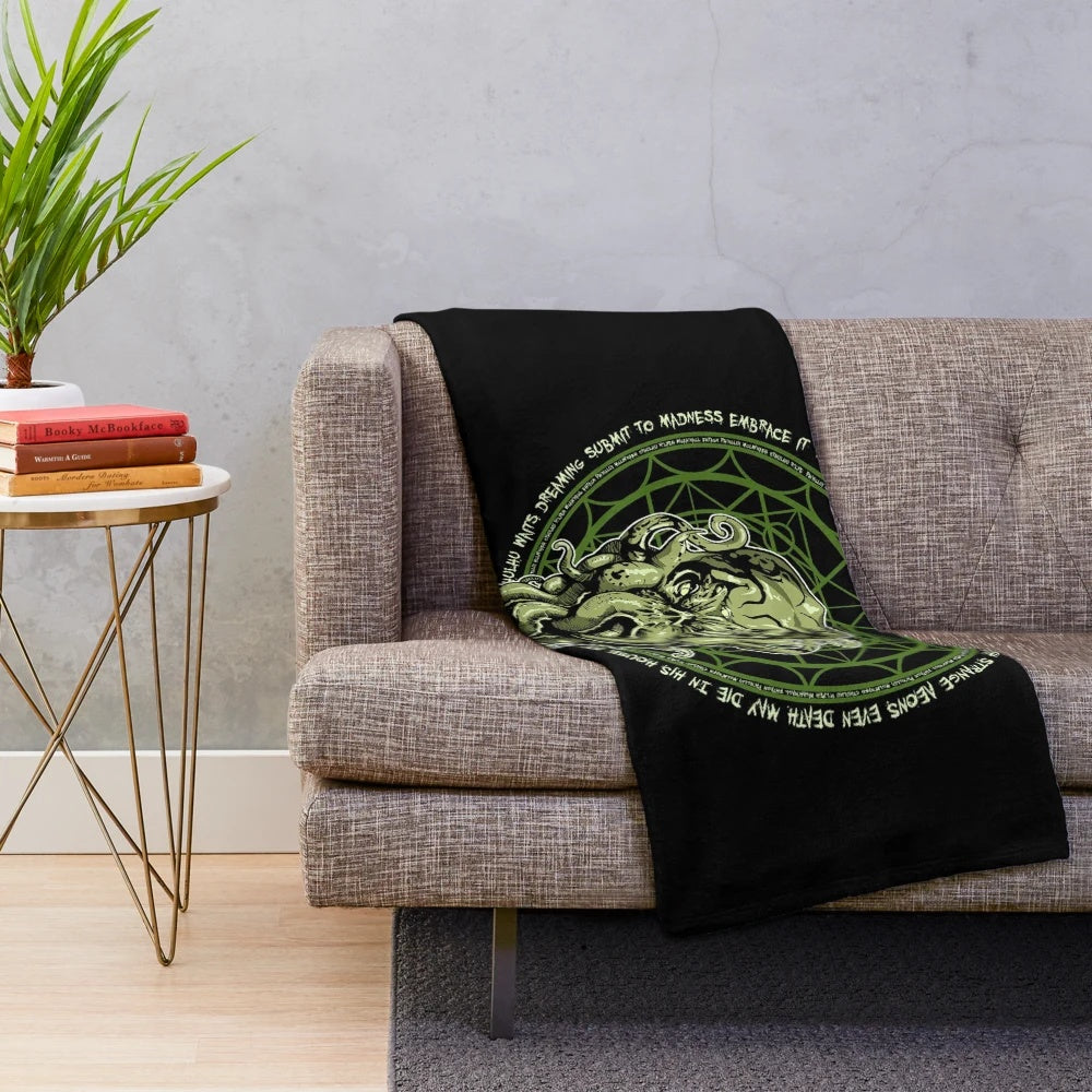 Cthulhu-inspired plush blanket with tentacles and horror elements