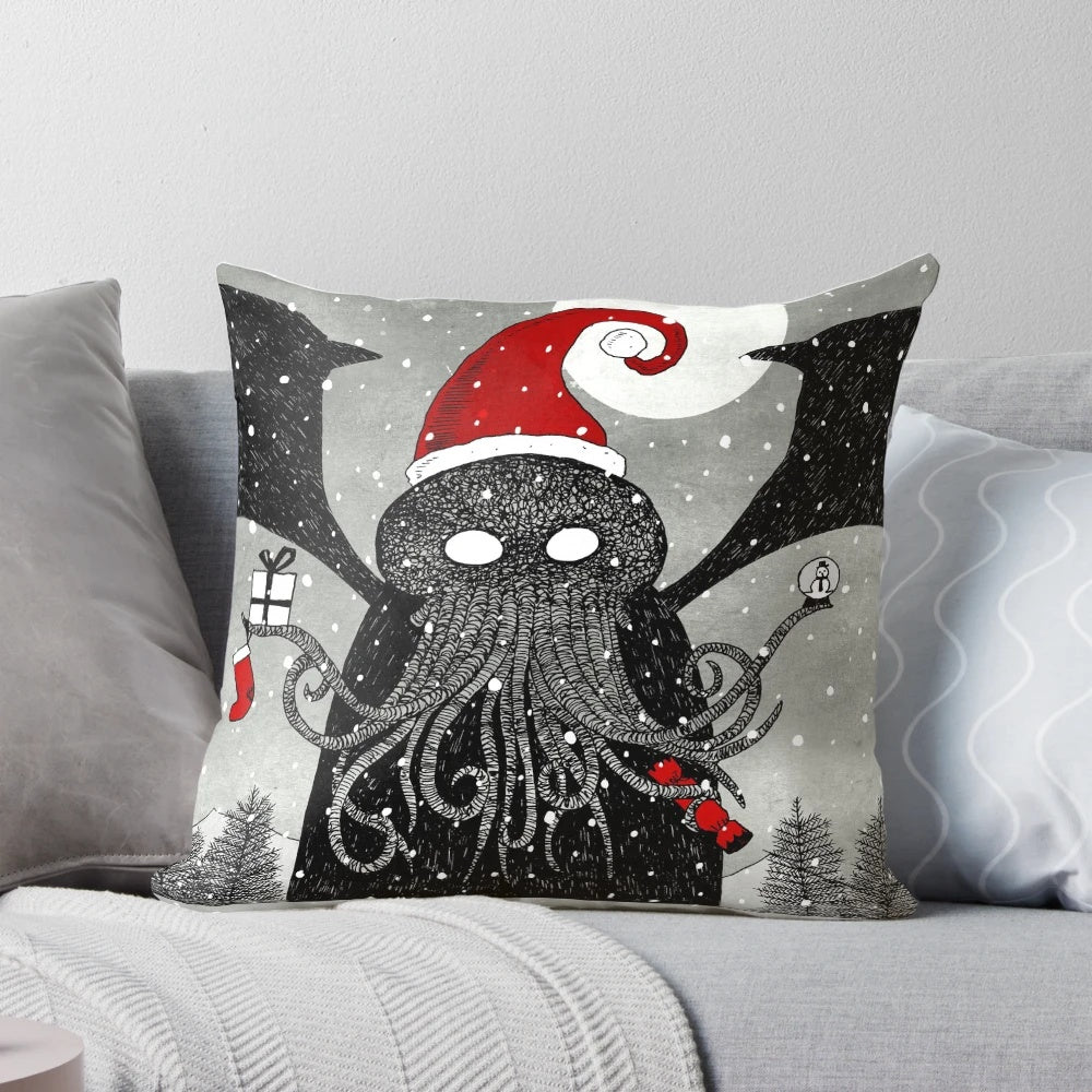 A decorative pillow featuring a whimsical design of Cthulhu wearing a Santa hat against a snowy, moonlit backdrop