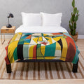 Colorful cubist-inspired plush blanket with abstract design