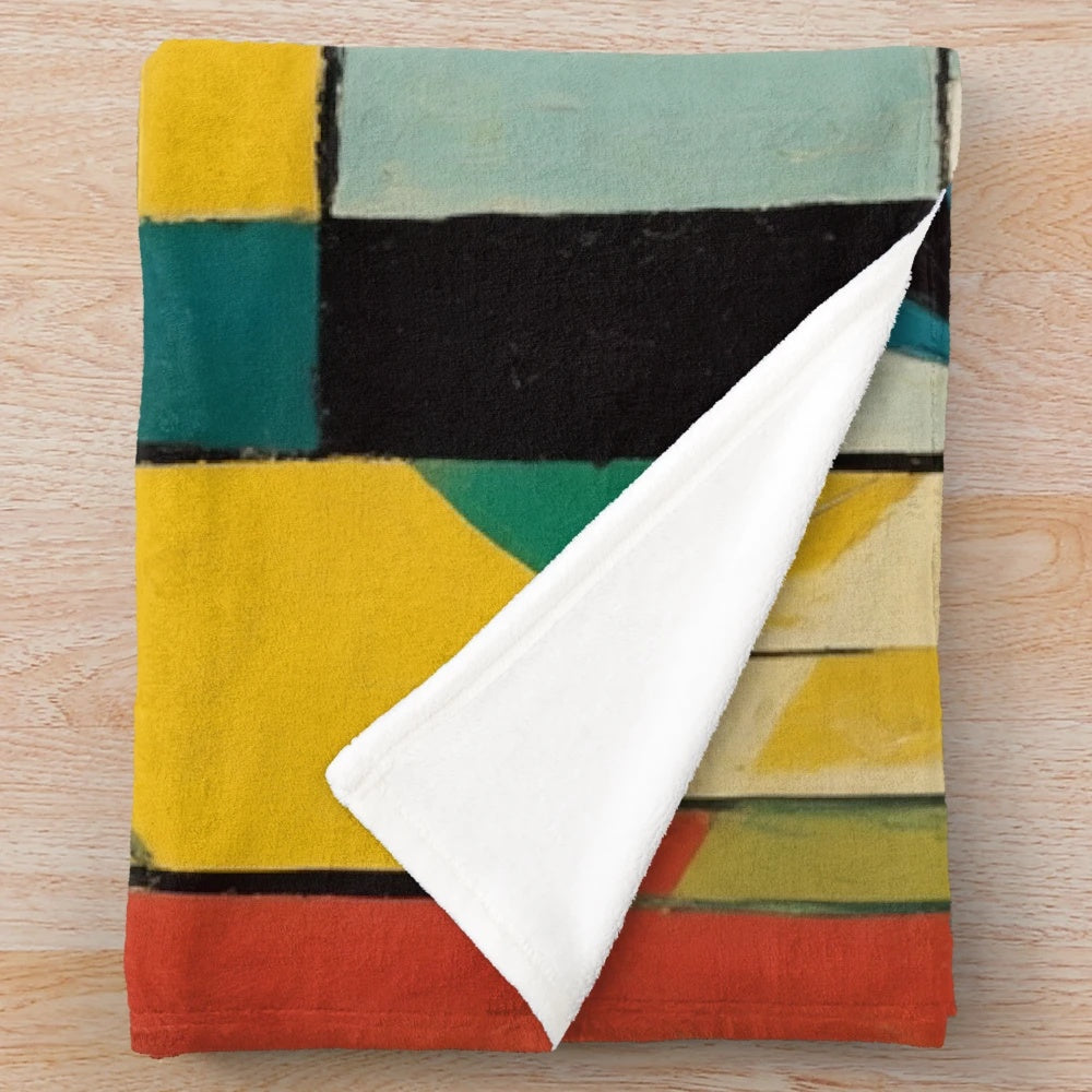Colorful cubist-inspired plush blanket with abstract design