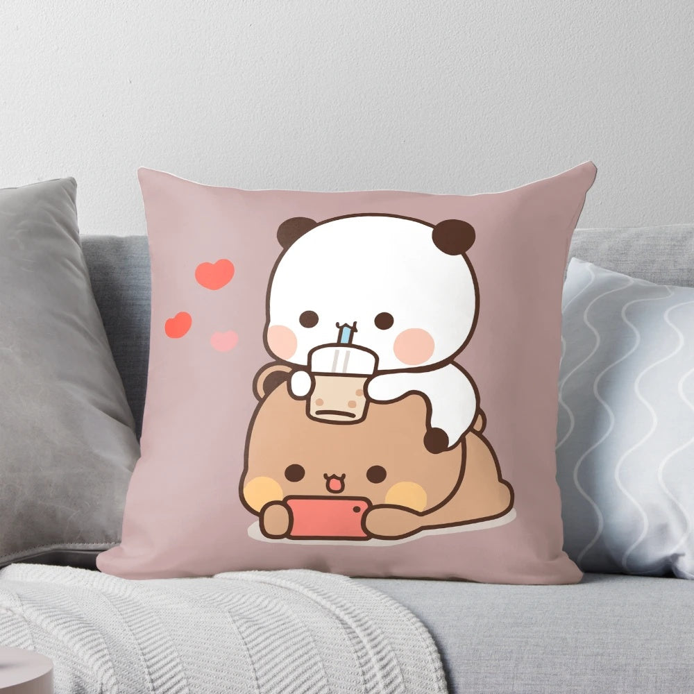 Dudu Bear and Bubu Panda, a cute cartoon couple, snuggling together on a soft, plush pillow