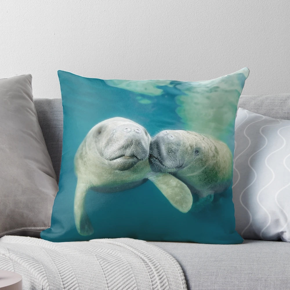 Lovers Pillow featuring a cute west indian manatee swimming underwater