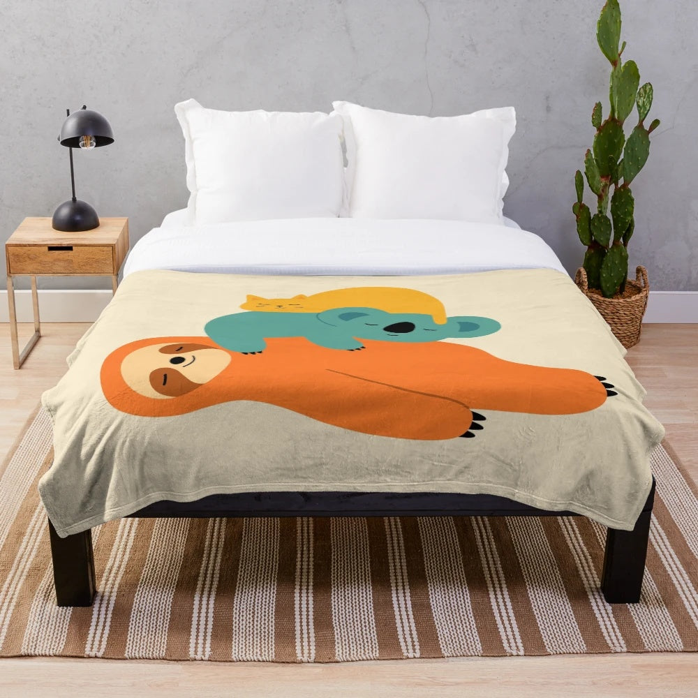 Cozy plush blanket with animal designs, perfect for relaxing and napping.