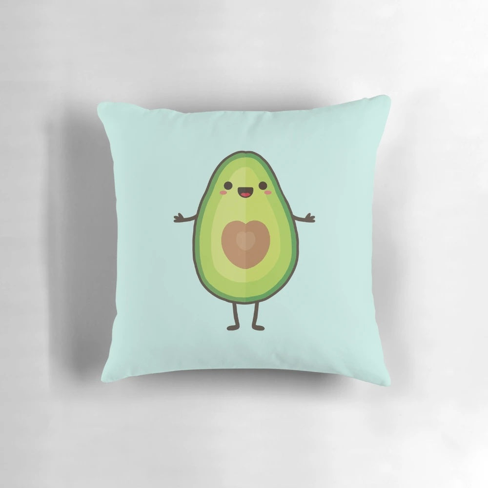 A plush, green avocado-shaped pillow with a cute, smiling face