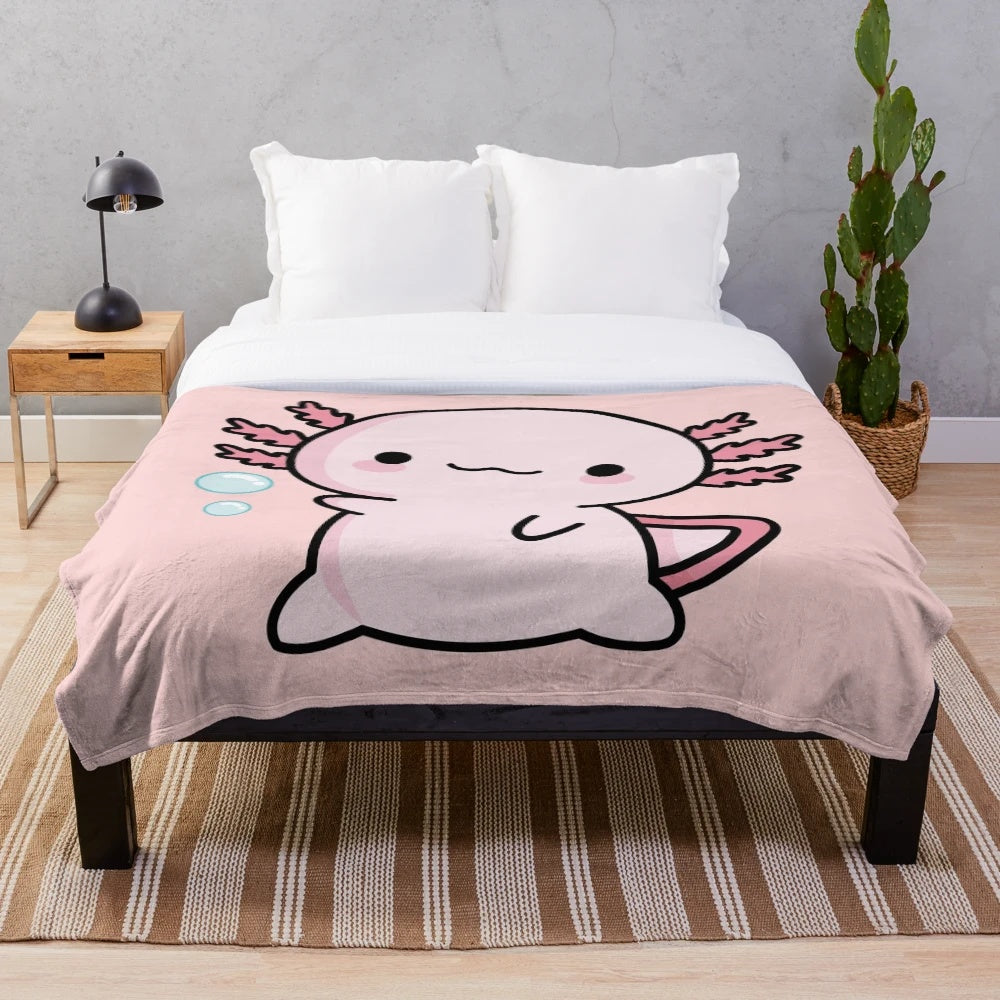 Soft and cute axolotl plush blanket with a pink doodle design
