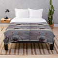 Soft and cozy plush blanket featuring the adorable baby hippo Fritz from the Cincinnati Zoo