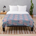 Cuddly ball python plush blanket with a cute, magical design