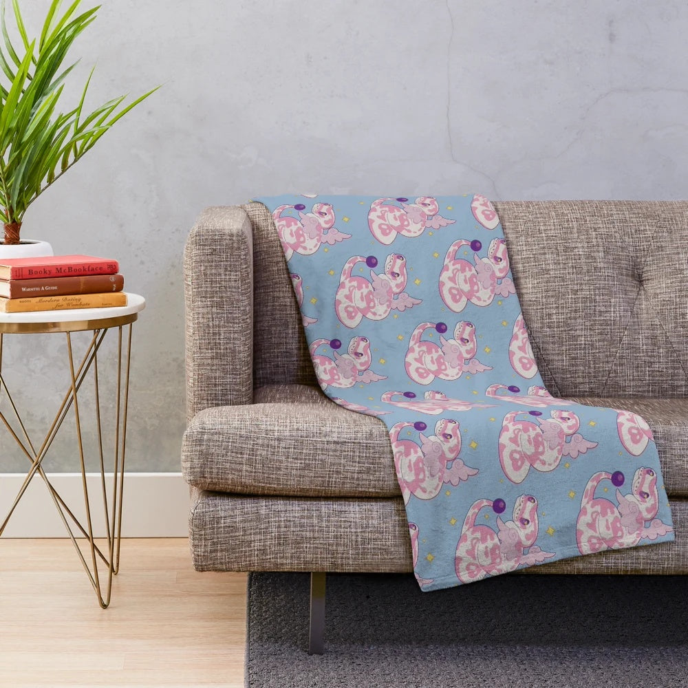 Cuddly ball python plush blanket with a cute, magical design