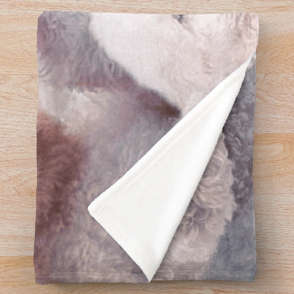 Bichons and Maltese dogs on a plush, soft blanket
