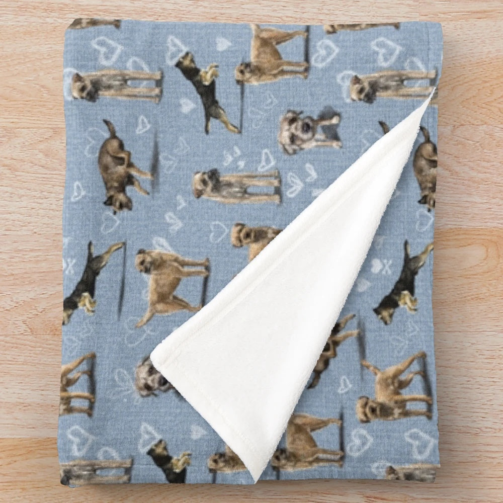 A soft and cozy plush blanket featuring the adorable Border Terrier dog breed