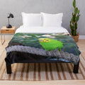 Soft, plush budgie-themed blanket in yellow and green colors