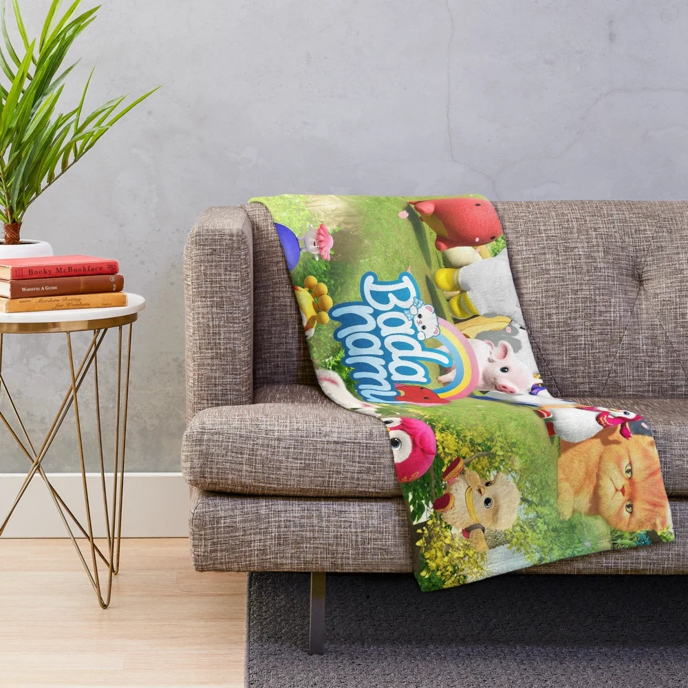 Soft and cozy plush blanket featuring a lovable cartoon character
