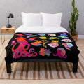 Plush cephalopod blanket featuring a cozy, soft design with ocean animal details