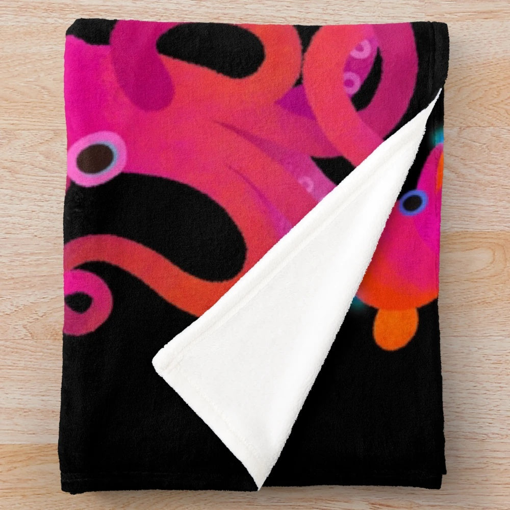 Plush cephalopod blanket featuring a cozy, soft design with ocean animal details