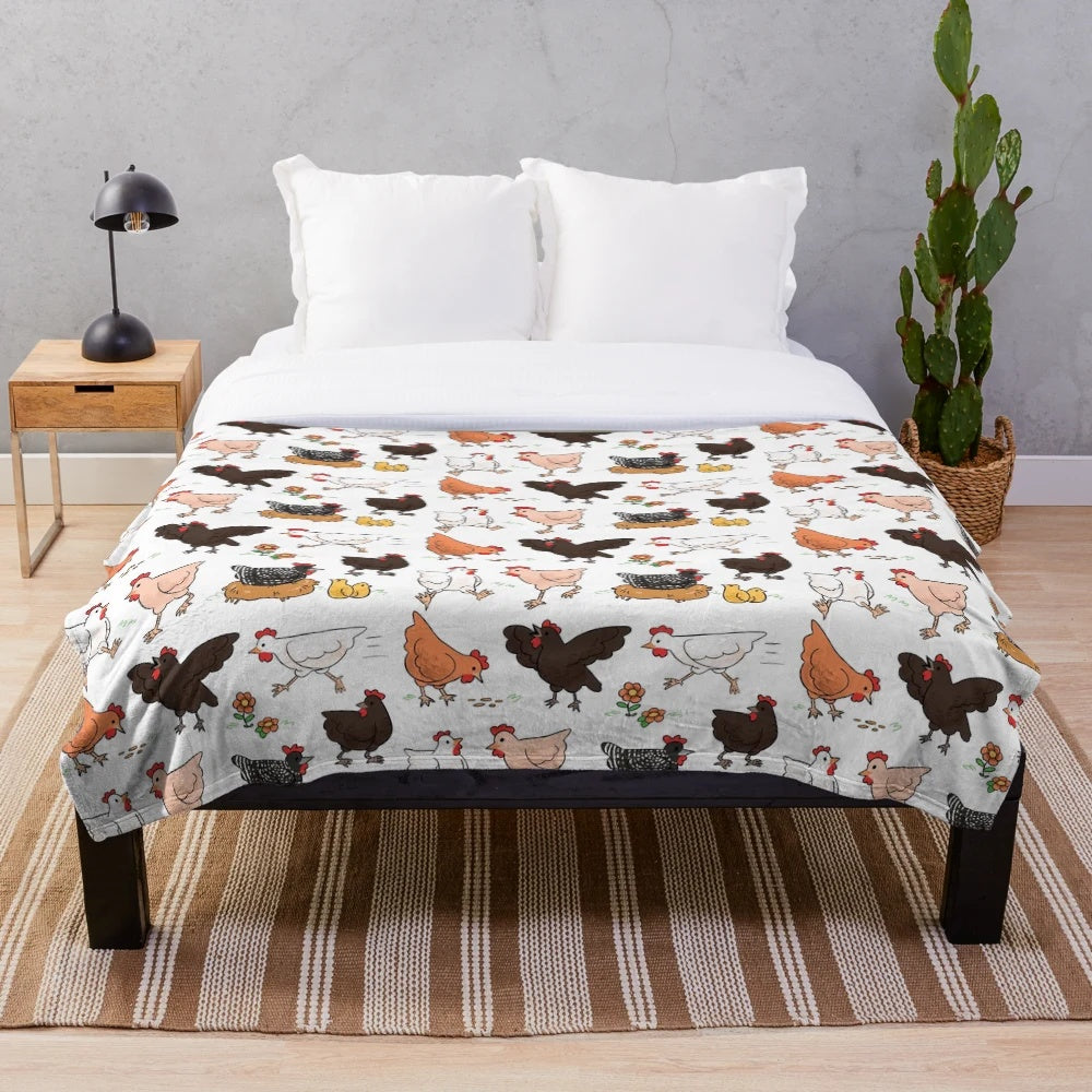 Soft, plush blanket featuring a colorful chicken pattern for a cozy and charming home.