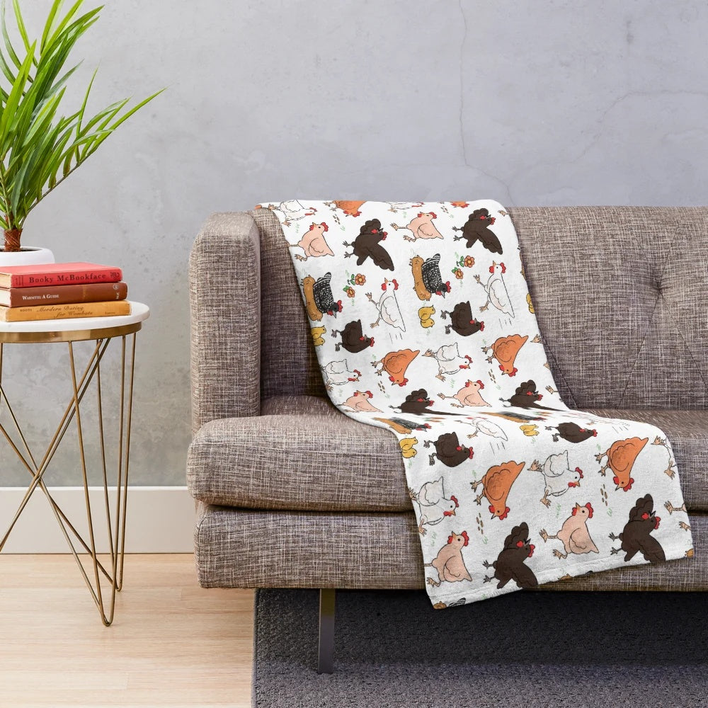 Soft, plush blanket featuring a colorful chicken pattern for a cozy and charming home.