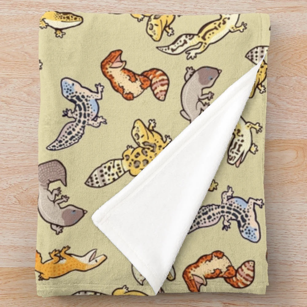 Cozy plush blanket featuring an adorable chub gecko design