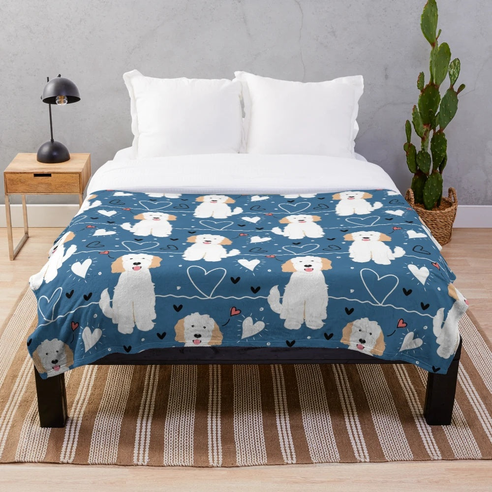 Soft and fluffy cream and white goldendoodle plush blanket