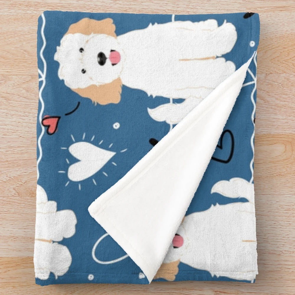 Soft and fluffy cream and white goldendoodle plush blanket