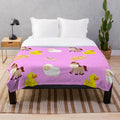 Soft, plush blanket featuring a cute animal design