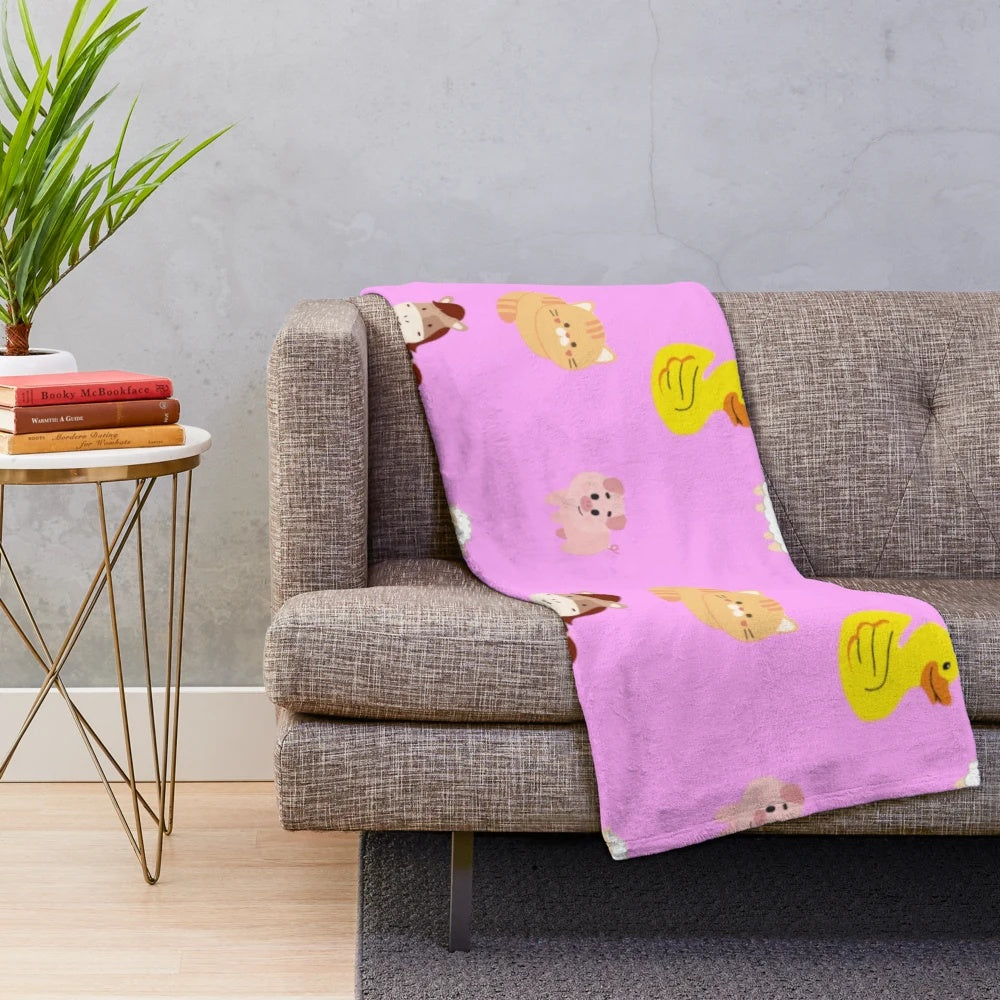 Soft, plush blanket featuring a cute animal design