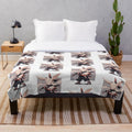 Soft and cozy plush blanket featuring a cute bunny design