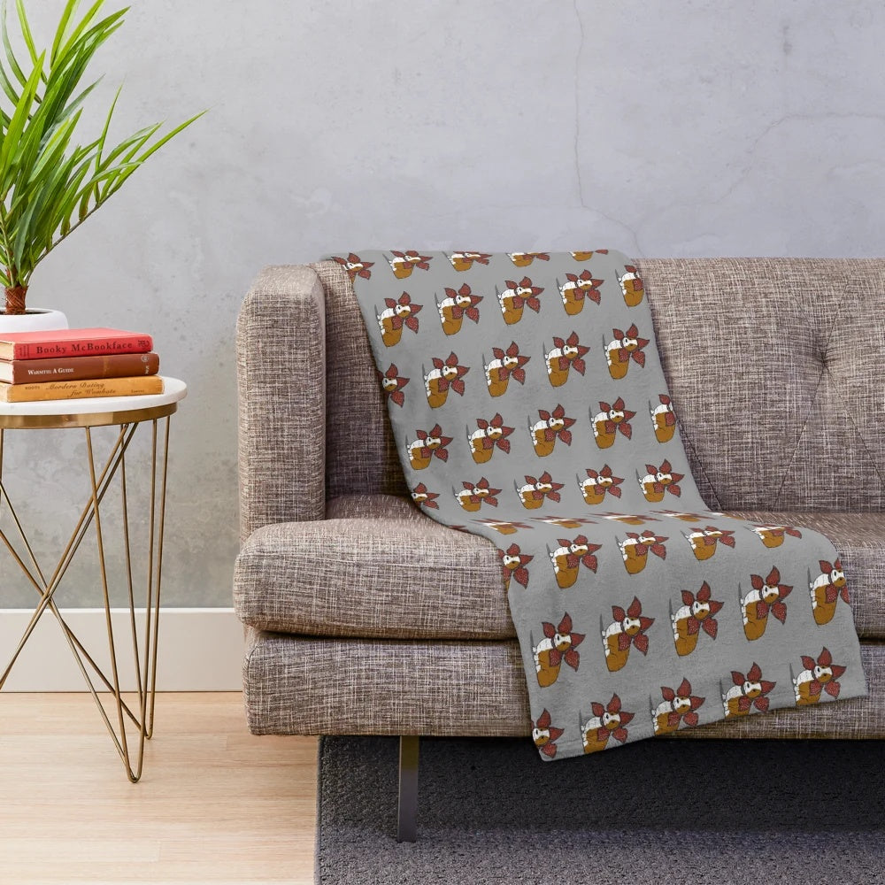 Democorgi inspired plush blanket featuring a cute corgi dog in a monster costume