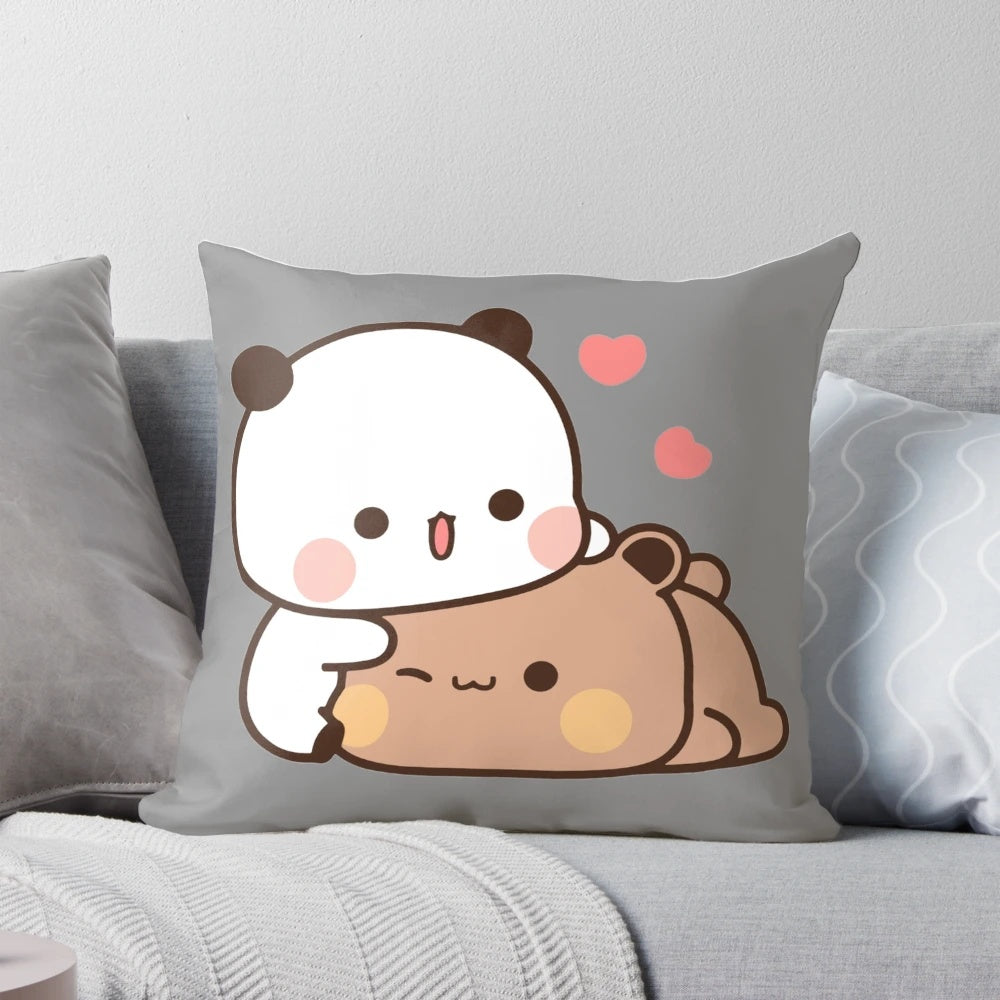 Soft, plush pillow featuring a cute cartoon couple of a brown bear and a panda bear, perfect for cozy, romantic moments.