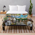Golden retriever collage plush blanket featuring cream and red retrievers