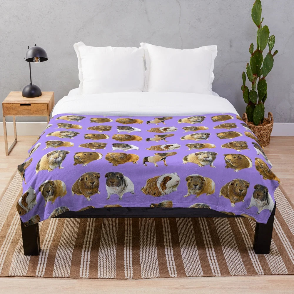 Soft and cozy plush blanket featuring adorable guinea pigs