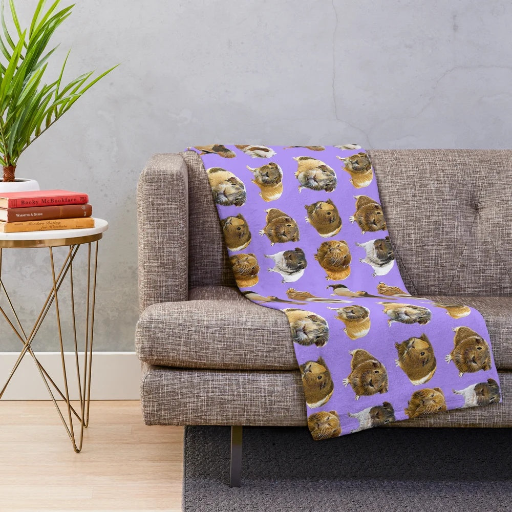 Soft and cozy plush blanket featuring adorable guinea pigs