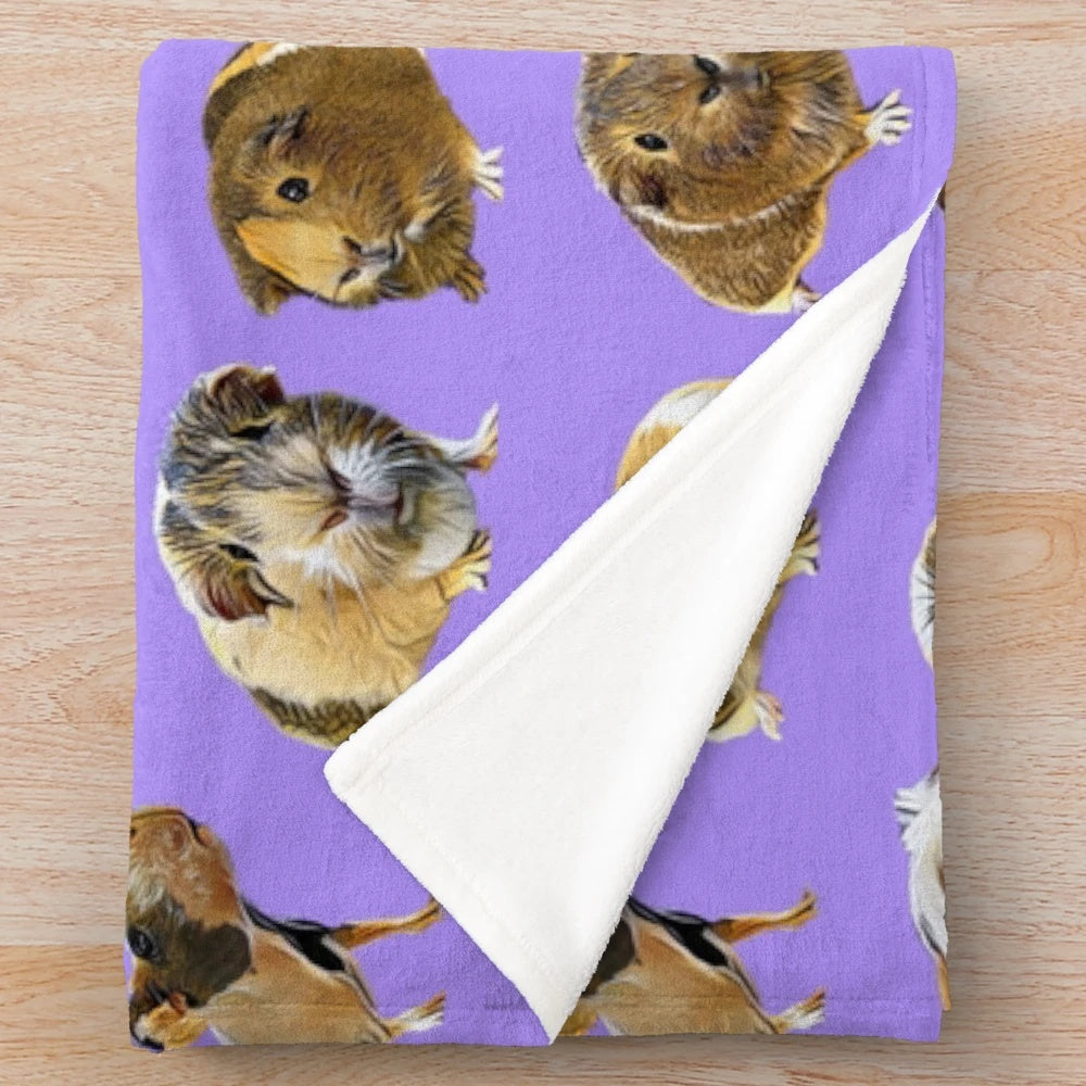 Soft and cozy plush blanket featuring adorable guinea pigs