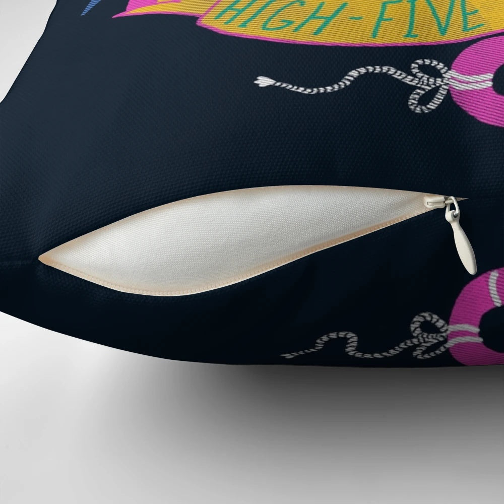Colorful plush monster pillow with open hand gesturing a high-five