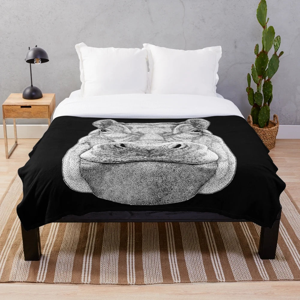 Soft, cuddly hippopotamus plush blanket with a whimsical drawing of a hippo