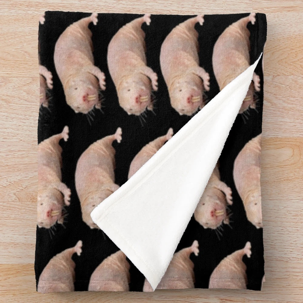 Soft and cuddly plush blanket featuring a cute mole rat design