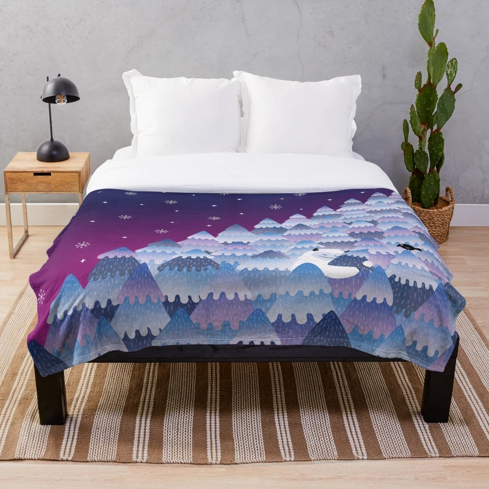 Plush blanket featuring a cozy monster design