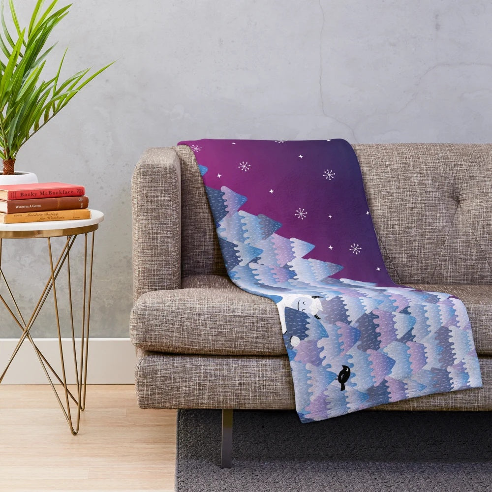 Plush blanket featuring a cozy monster design