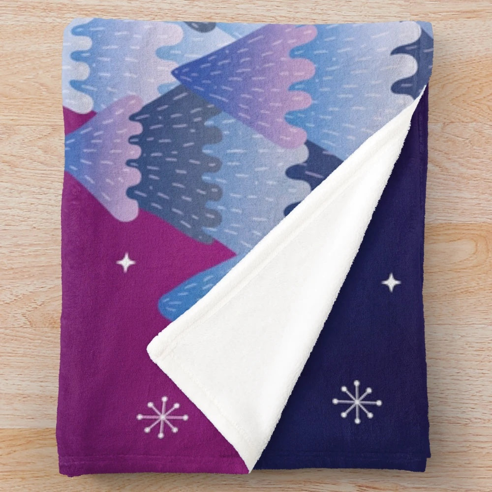 Plush blanket featuring a cozy monster design