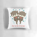 Soft and plush pillow featuring two cute otters holding hands