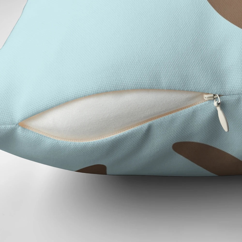 Soft, plush pillow featuring a heart-shaped design with two adorable otters cuddling.