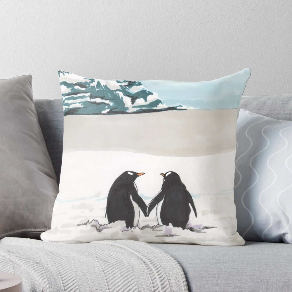 Soft and plush pillow featuring a loving couple of penguins in a snowy, arctic scene