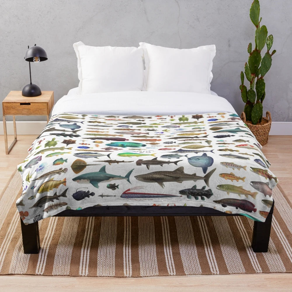 Plush blanket with various fish, sea creatures, and Animal Crossing critters