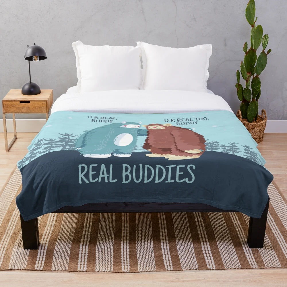 Soft and cozy plush blanket featuring a bigfoot or sasquatch design